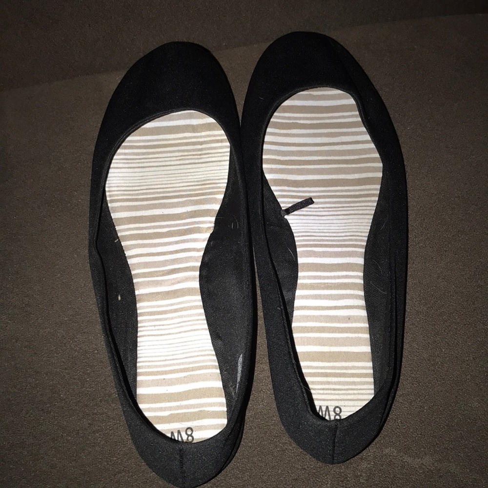 Black shoes. Ballet type shoes.